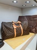 Louis Vuitton Monogram luggage holdall, Serial Number DU4101. The item is in very good condition, wi