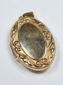 9ct yellow gold oval locket, marked 375, 3cm x 2cm, approx 4.67g