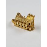 Large 9ct yellow gold charm/pendant in the form of a Church, the base opening to reveal a font, mark