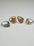 Four Silver dress rings