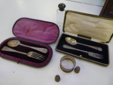 A cased silver fork and spoon hallmarked Sheffield 1915, C.W. Fletcher and Son Ltd. With a Victorian