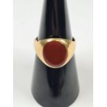 18ct yellow gold signet ring with oval Carnelian panel, size N, marked 18ct, approx 5.2g