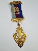 Of Masonic Interest; a 9ct gold badge of Royal Antediluvian Order of Buffaloes, Nemo Martalium Omnib