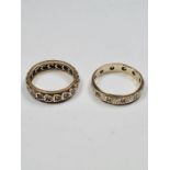 Two 9ct eternity rings, set clear stones, one of interlocking heart, sizes N & P, approx 5.91g