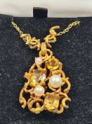9ct gold fine neckchain, with 9ct gold pear shaped panel set with pearls and citrines marked 375, ap