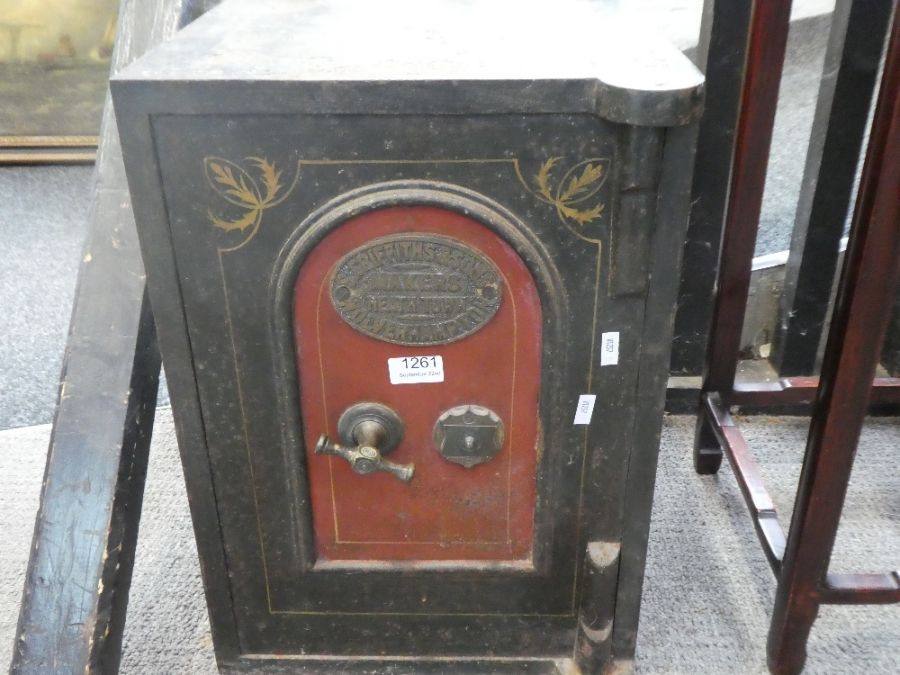 An early 20th Century, iron safe by Griffiths and Sons, Wolverhampton, with key