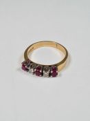 18ct yellow gold ruby and diamond half hoop ring set 3 round cut rubies and 2 diamonds in raised 4 c
