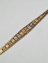 9ct tri-gold bracelet with graduating alternating coloured panels, marked 375, approx 5.48g