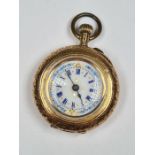 Continental 14K yellow gold fob watch with white enamelled dial, Roman numerals, with floral decorat