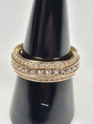 14K yellow gold band ring inset clear stones, marked 14K, size Q, approx 4.81g