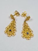 Pair of attractive 18ct yellow gold drop earrings with circular beaded panel suspended ornate pear b