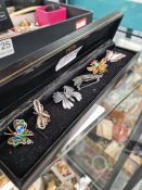 Selection of silver butterfly brooches, on an articulated example, enamelled example, filigree examp