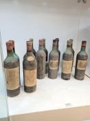 12 Bottles of vintage red wine mainly from the World War II period to include Chateau Mouton Rothsch