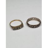 Two 9ct and silver rings, a band ring and paste set example, both marked 9ct and Sil, approx 5g