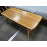 An Ercol oblong 2-tier coffee table having elm top