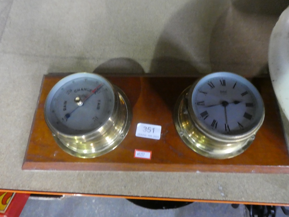 A brass clock and barometer mounted set by 'Sestrel' and a vintage wall clock A/F