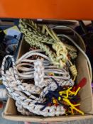 Two boxes of military shoulder badges, patches, braid and similar