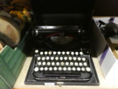 An old underwood portable typewriter in Rexine case