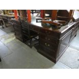 A large reproduction mahogany twin pedestal desk having 8 drawers, 183cm