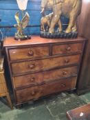 A Victorian mahogany chest having two short and three long drawers