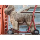 A Lines Brothers (Triang) vintage push along dog and a vintage wooden rocking horse (A/F)