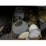 A box of mixed collectables, including brassware