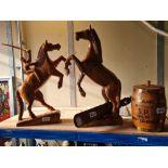 A pair of carved horses, one with rider. A 1930s Indian paper knife and a small barrel marked Wilson