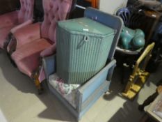A Lloyd Loom corner linen basket and a chair
