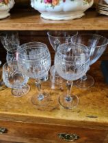 A St Louis candle stick having gilt decoration, three similar St Louis wine glasses; a pair of Water