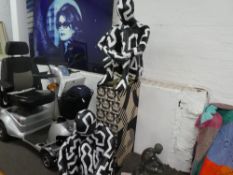 A shop display of two mannequins, from a London store, painted black and white design