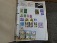 Four cartons of GB and Worldwide stamps to include some 19th Century