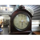 A 19th Century, mahogany long case clock having round painted dial