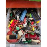 A box of mixed playworn die cast vehicles