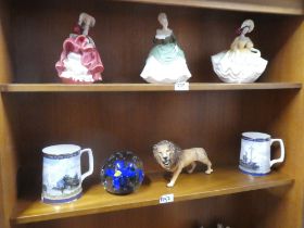 A selection of ceramics including Doulton & Beswick figures, commemorative tankards and a large crys