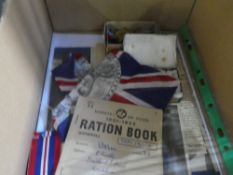 Three various World War II medals, two ration books and other related items