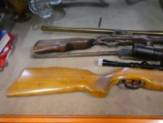 A selection of reproduction wall hanging guns, foreign made air rifles, all A/F