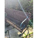 Two garden benches having metal supports