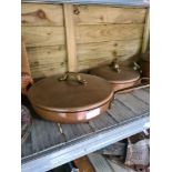 Three copper plated saucepans with lids