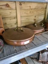 Three copper plated saucepans with lids