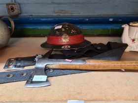 A world War II period Fire Service Brodie helmet with liner, and strap, with similar belt and Firema