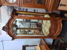 An early 20th Century, French carved walnut display cabinet having single door, (one side panel miss