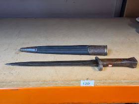 A War Department bayonet with original leather and metal sheath