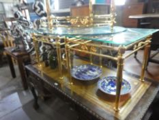 A pair of modern brass plated square coffee tables, with bevelled glass top, frieze decorated flower