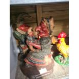 A pair of Iron door stops, Punch and Judy and two other items