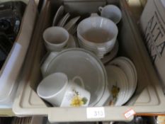 A selection of vintage Pyrex including dishes plates, covered dishes, plates, etc