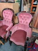 Two similar Victorian mahogany button back arm chairs