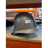 A US Military M1 helmet with painted decals (no liner)