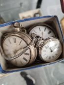 Two antique pocket watches and a modern example