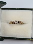 Boxed 18ct yellow gold diamond ring with central round cut diamond in claw mount, approx 0.10 carat