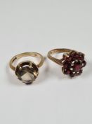 Two 9ct yellow gold dress rings, one a garnet cluster ring the other set with circular round cut Cit